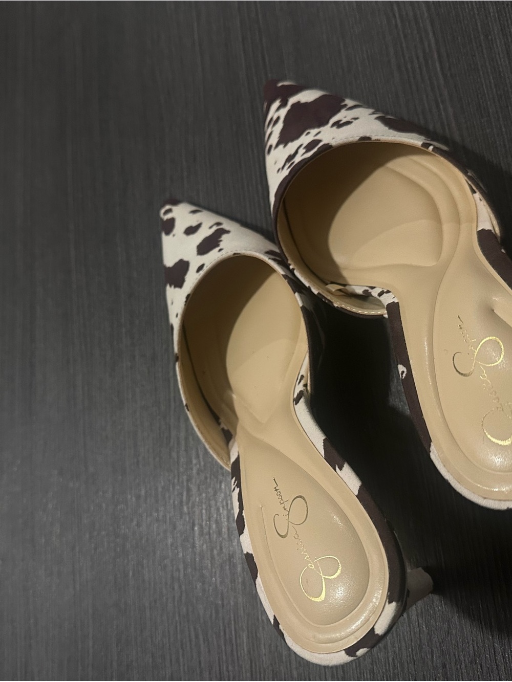 Jessica Simpson Cowprint Pointed-Toe Mules in Black & White